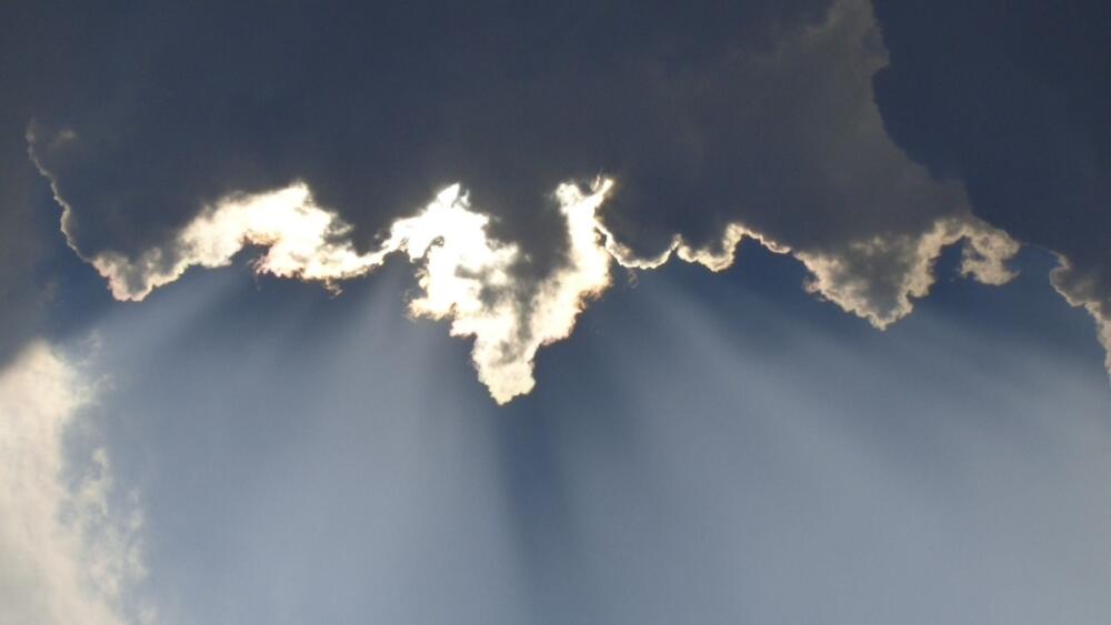 Wolken und Sonne